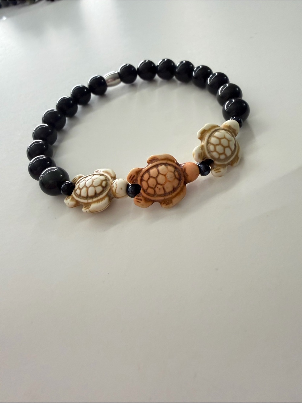 Handcrafted Turtle Bead Bracelet in Black and Cream